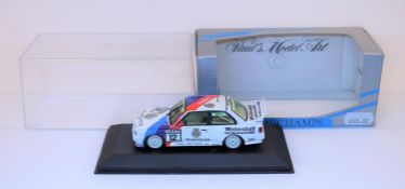 Minichamps 1:43 BMW E30 M3 Racing Car. Bigazzi/Warsteiner, racing number 12, driver Hahne. Boxed,