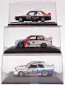 2 Minichamps 1:43 BMW. An M3 E30 racing car. Original BMW Teile, racing number 69, driver