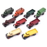 9 Dinky Toys 25 series trucks. 5x 25a Wagons. One type 2 with open chassis in dark green. 2x Type 3,