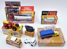 7 Dinky Toys. Commer Convertible Articulated Truck (424). Tractor unit is in yellow and silver, with