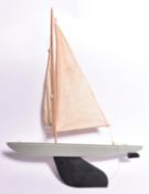 A 1950s/60s Bowman Admiral Series pond racing yacht. Painted wooden hull with heavy metal keel and