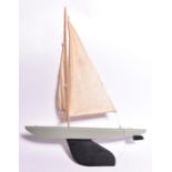 A 1950s/60s Bowman Admiral Series pond racing yacht. Painted wooden hull with heavy metal keel and