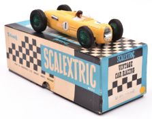 A Tri-ang Scalextric Auto Union 6 litre 1936 (C71). Example in yellow with driver and green