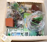 A quantity of 1960s Britains Garden. Floral Miniature Garden items including; a Greenhouse, cold