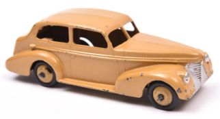 Dinky Toys 39 Series Oldsmobile 6 sedan (39b). A scarce example in tan, with tan ridged wheels