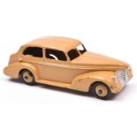 Dinky Toys 39 Series Oldsmobile 6 sedan (39b). A scarce example in tan, with tan ridged wheels