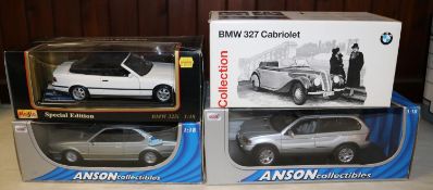 4 1:18 scale BMW cars by various makers. BMW Classic Collection 327 Cabriolet in black and cream,
