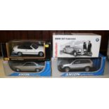 4 1:18 scale BMW cars by various makers. BMW Classic Collection 327 Cabriolet in black and cream,