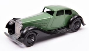 Dinky Toys 36d Rover. An example in dark green with black chassis, ridged wheels and black tyres.