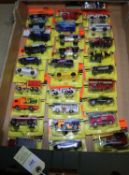 30 1990's Matchbox MB size vehicles in blister packs. Vehicles include- Ford Transit, VW Concept
