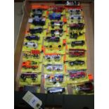 30 1990's Matchbox MB size vehicles in blister packs. Vehicles include- Ford Transit, VW Concept