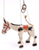 A Matchbox Moko Lesney Muffin the Mule. Cast metal body with rivetted articulated joints. Complete
