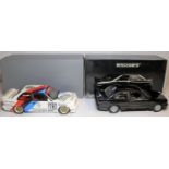 2 Minichamps 1:18 1987 BMW M3 E30. A 'Street' example in black with grey interior. Plus a 'Point-