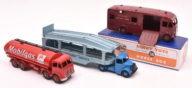 3 Dinky Toys. An American issue Express Horse Box in maroon with red wheels. In a good