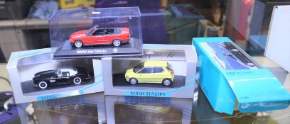 3 Minichamps 1:43 BMW's. 3 series Convertible in red with black interior. An E1 (023000), in