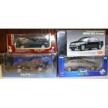 4 1:18 scale BMW cars. Kyosho 3series saloon in black with maroon interior. Autoart Performance