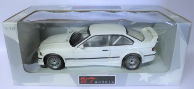 UT Models 1:18 BMW M3 E36. An unliveried example in white, in full racing trim. Boxed. Vehicle