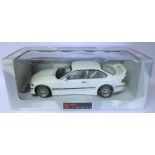 UT Models 1:18 BMW M3 E36. An unliveried example in white, in full racing trim. Boxed. Vehicle