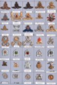 35 South African cap badges, mostly modern, a few earlier, including Natal Field Artillery bronze