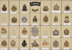 24 WWII and later Canadian cap badges, mostly Infantry, also a brass “CANADA” and similar cloth