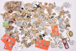 Over 2lbs weight of assorted anodised cap and collar badges, mostly British, and approximately 120