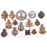 12 various cap badges of Military Training Establishments etc: bronzed Ryl. Military Academy, GRV