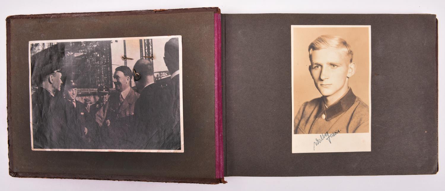 A Third Reich photograph album, the cover mounted with Luftwaffe metal cap eagle and RAD metal cap - Image 2 of 2