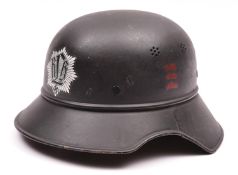 A Third Reich 3 piece Luftschutz steel helmet, with RLB transfer to the front, the inside of the