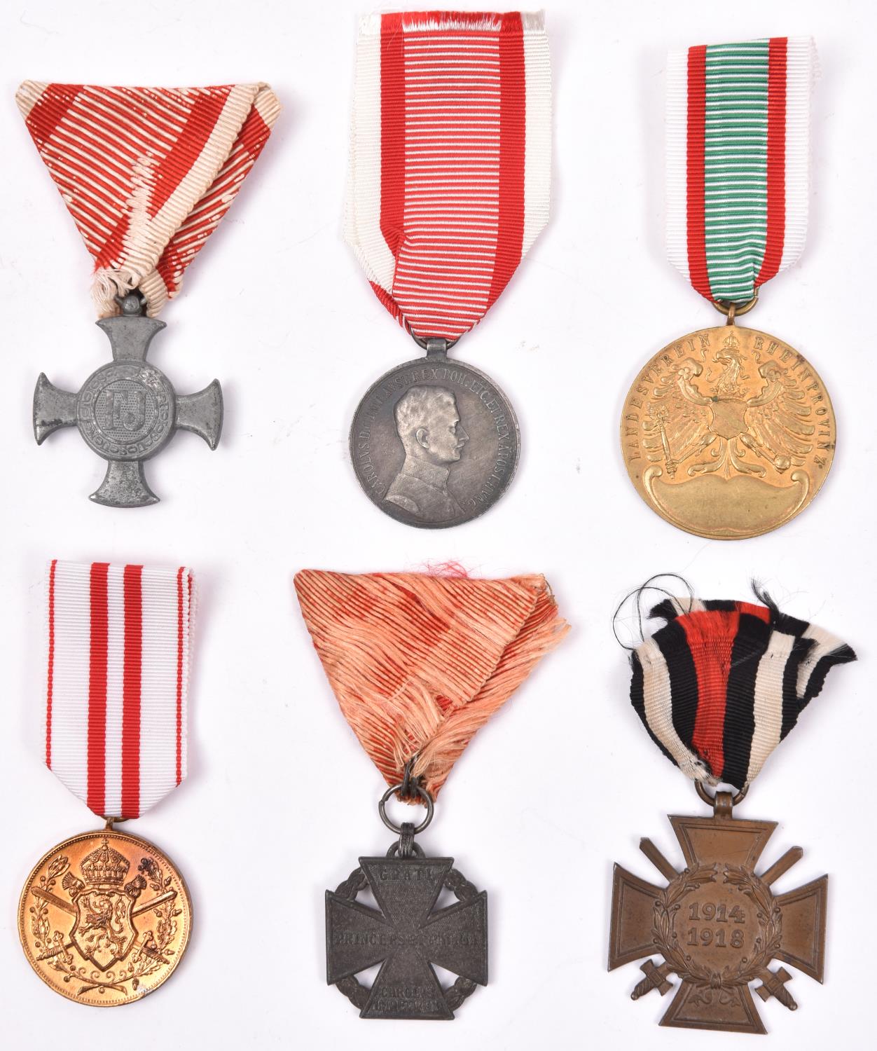 6 WWI Austrian and other war medals: Austrian Iron Cross of Merit without crown, post 1917 Medal for