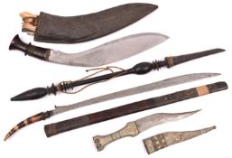 A Malaysian Bade Bade type knife or short sword, slender wedge shaped SE blade 18½”, the hilt formed