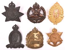 5 pre WWII Australian Infantry cap badges: 22nd, 32nd, 43rd, 47th (Wide Bay), and 57th, and 1948-