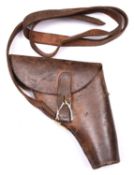 A scarce WWII flap top leather holster for a flare pistol, with leather belt loop stamped “E