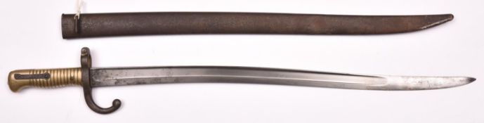 A French 1866 pattern Chassepot bayonet, the blade engraved “St Etienne Avril 1877”, the brass hilt,