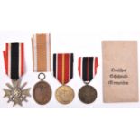 Third Reich medals: War Merit Cross 2nd Class with swords, War Merit Medal, West Wall Medal with