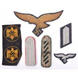 A large gold bullion embroidered Luftwaffe officer’s cloak eagle, 7” across; an embroidered