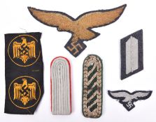 A large gold bullion embroidered Luftwaffe officer’s cloak eagle, 7” across; an embroidered