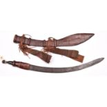 A Sudanese sword, SE curved blade 24½”, with very faint central ridge, polished leather grip with