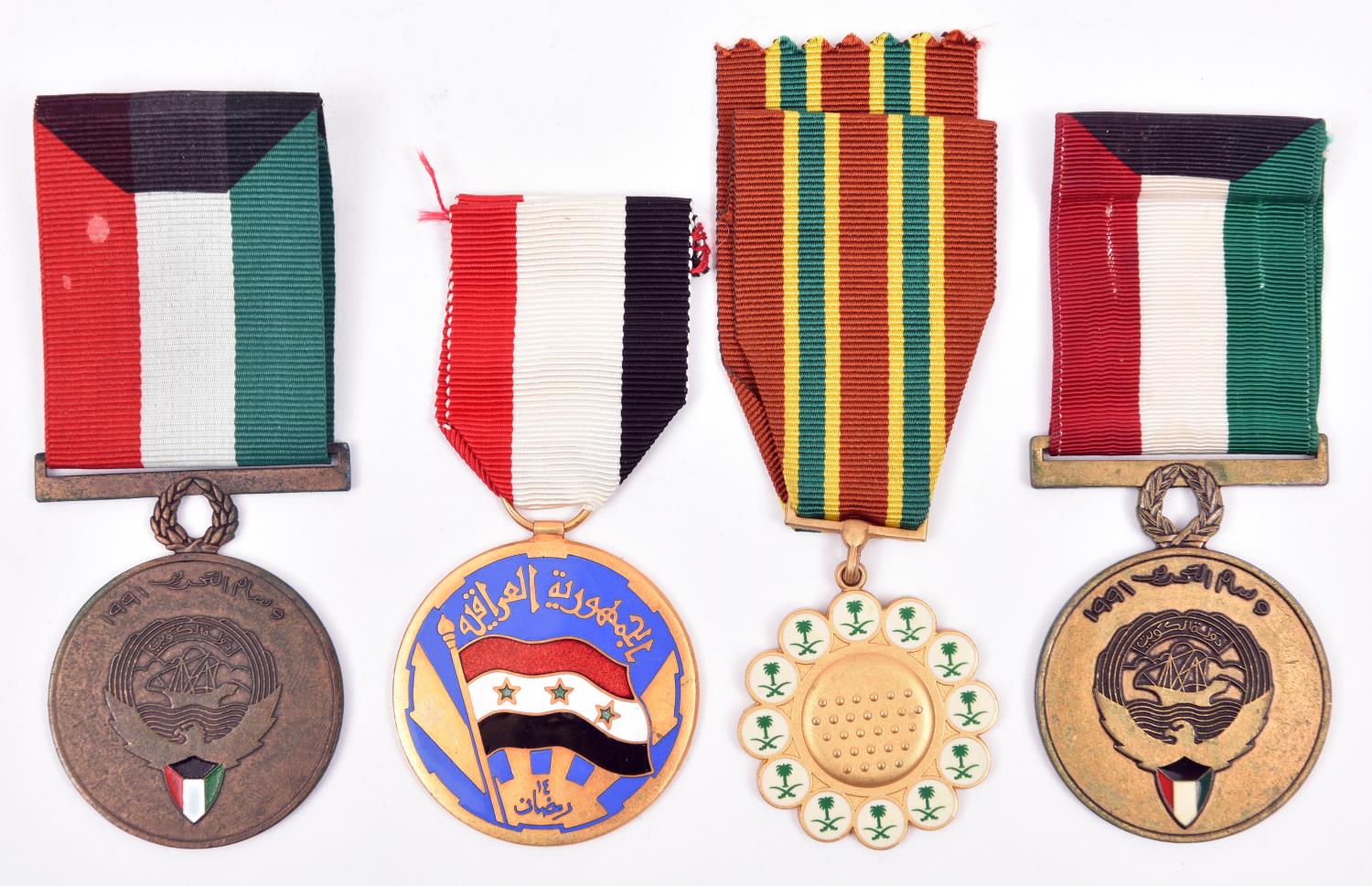 Gulf War period medals (3): Saudi Arabia combat medal Nuth Al-Ma”rkat and 2 Kuwait Liberation