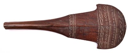 A Samoan hardwood War Club, 19th century or earlier, 18" overall, the fan shaped head carved with