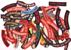 Approximately 90 WWII and later British embroidered cloth shoulder titles, Infantry, Corps, etc,