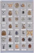 35 South African cap badges, mostly modern; also two pairs of collar badges, mostly with bolt and