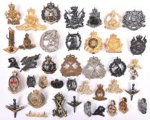 24 post 1953 to circa 1980s Australian cap badges, Armoured, Infantry and Corps, some with spike and