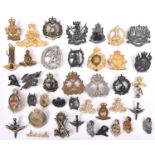 24 post 1953 to circa 1980s Australian cap badges, Armoured, Infantry and Corps, some with spike and