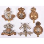 6 Cavalry cap badges: Vic 7th Hussars, KC 7th Hussars and WWI all brass, 8th Hussars (QEII), 9th