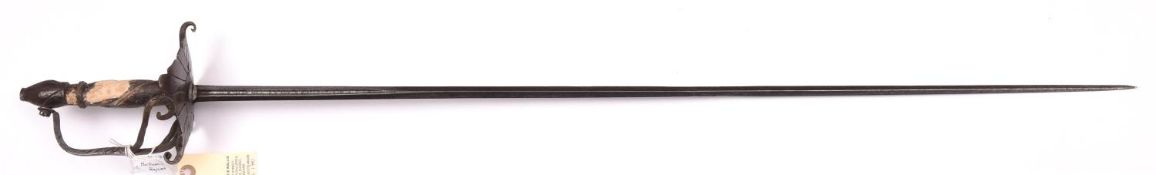 A mid 17th century rapier, 34” blade of slender diamond section with deep fullers bearing