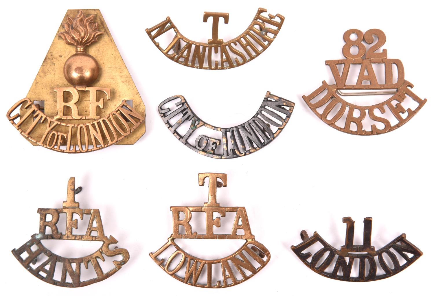 6 Territorial brass shoulder titles: T/RFA/LOWLAND (1 lug missing), 1/RFA/HANTS (worn), grenade/RF/