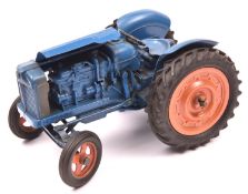 Chad Valley clockwork Fordson Major tractor. In light blue with orange wheels and black rubber