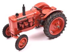 A model of a Nuffield Universal tractor by Denzil Skinner Co. Ltd. Example in dark orange. QGC-GC,