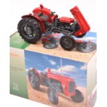 A Universal Hobbies 1:16 scale model of a Massey Fergusson MF35X tractor (UH2692). A very well