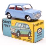 Corgi Toys Morris Mini Minor (226). In lilac with red interior, dished spun wheels with black tyres.